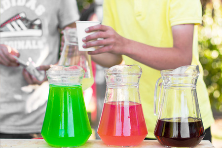 lemonade stand in summer sun rays vintage retro backgroundの写真素材
