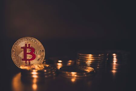 Golden Bitcoin coins. The first decentralized cryptocurrency BTCの写真素材