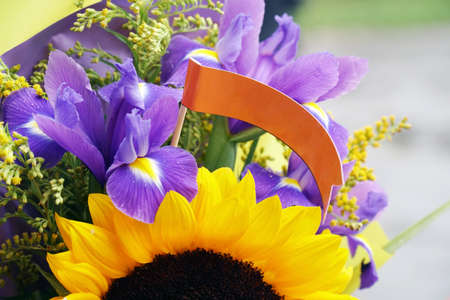 sunflowers in a bouquet with a flag note note for the inscriptionの写真素材