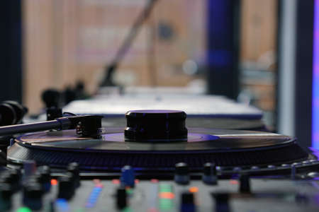 Close-up, vintage record player, While playing the record, Black platter.の写真素材