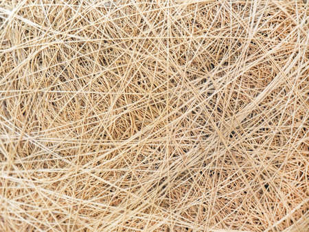 Threads, ball, surface background beige brown yellowの写真素材