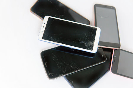 Service of phones and smartphones. Lots of phones broken