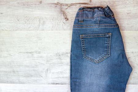 jeans blue close-up on wooden tableの写真素材