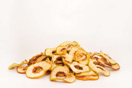 dried apples with a slide on white background isolateの写真素材