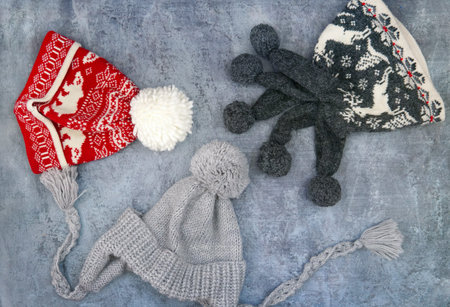 Winter hats red. gray. with pattern. Top viewの写真素材