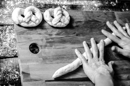 Dough dainted by the woman on the boardの写真素材