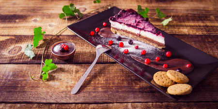 Homemade cheesecake with fresh berries and chocolate for dessert - healthy organic summer dessert pie cheesecake.の写真素材