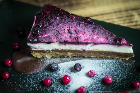 Homemade cheesecake with fresh berries and chocolate for dessert - healthy organic summer dessert pie cheesecake.の写真素材