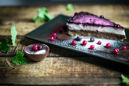 Homemade cheesecake with fresh berries and chocolate for dessert - healthy organic summer dessert pie cheesecake.の写真素材