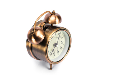 Old alarm Colck of copper color or rust color in isolate background.の写真素材