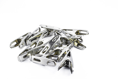 Stainless cloth pegs on isolate backgroundの写真素材