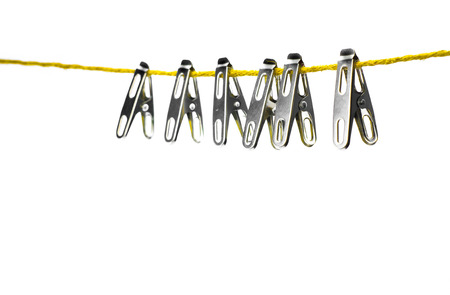 clothespin of stainless on rope with isolate whiteの写真素材