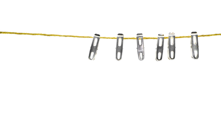 clothespin of stainless on rope with isolate whiteの写真素材