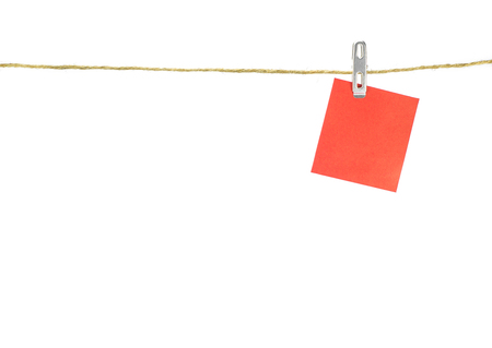 Notes paper cards in clothes pegs on rope with isolate backgroundの写真素材