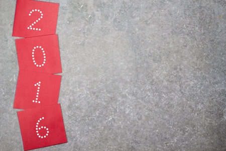 happy new year 2016 word on the Notes paper cards on table