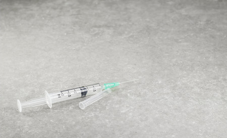 syringe for treatment on gray backgroundの写真素材