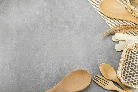 Wood spoon , fork , wood ladle, wood baskets that are placed on the table. equipment ofwood for the background. Space for textの写真素材