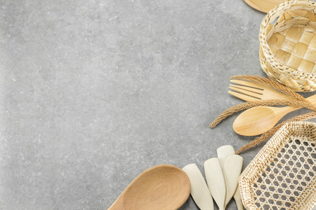 Wood spoon , fork , wood ladle, wood baskets that are placed on the table. equipment ofwood for the background. Space for textの写真素材
