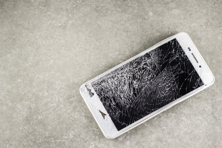 mobile touch screen is broken, mobile display damage from height drop, mobile user is not careful,の写真素材