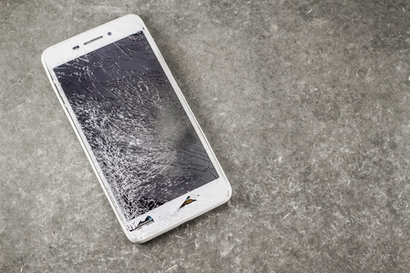 mobile touch screen is broken, mobile display damage from height drop, mobile user is not careful,の写真素材