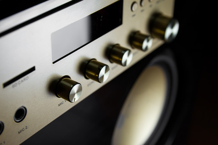 Amplifier button control of audio system for music background style in dark tone and select focus.の写真素材