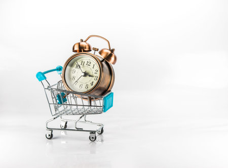 Concept of buying time. By using the symbol clock in the cart.の写真素材