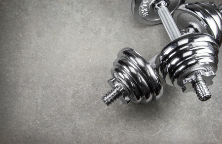 Fitness dumbbells background.の写真素材