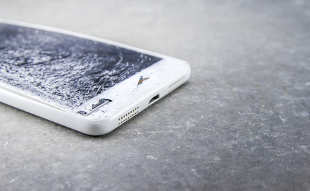 mobile broken touchscreen on gray background.の写真素材