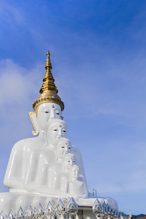 Buddha white in Thailand on blue sky background.の写真素材