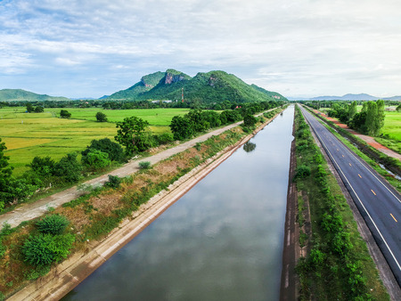 The canal for paddy fields in rural Thailand. bird eye view.の写真素材
