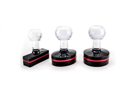 Rubber stamp on white isolate background.の写真素材