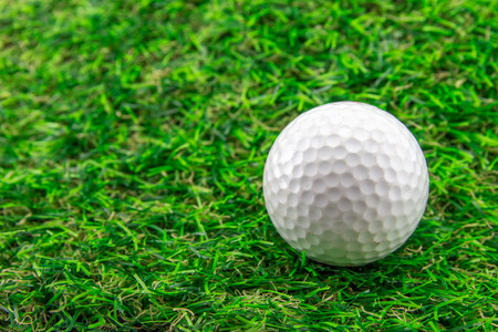 Golf ball and green grass.の写真素材