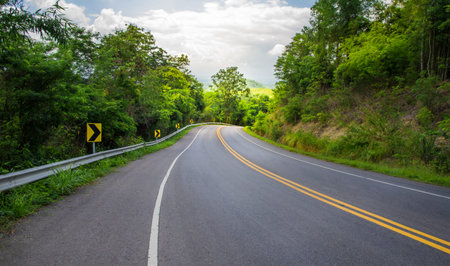 Country road on rainy season of Thailand.