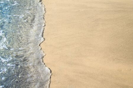 Texture of sands and sea on the beach for background.の写真素材