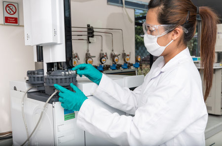 Woman working on centrifuge