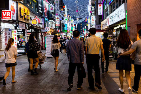 Suwon, South Korea - June 14, 2017: People walking along the main street in Suwon at night. Korean nightlife.のeditorial素材