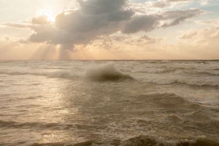Quiet beautiful golden sunset on the sea. Summer nature backgroundの写真素材