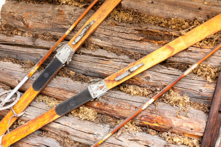 Pair of old fashioned wooden brown skis