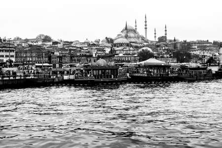 Istanbul, Turkey - December 6, 2014: The Suleymaniye Mosque view from Golden Horn, people visit the cafe in boats and watch Bosphorus in Istanbul.のeditorial素材