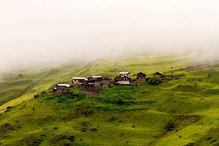 Small mountain village in morning mist. Georgia, Tushetiの写真素材