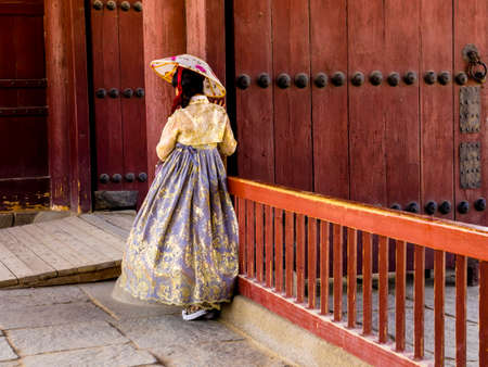Seoul, South Korea - June 3, 2017: Young women in colorful traditional wear - hanbok visiting the Gyeongbokgung Palace.のeditorial素材