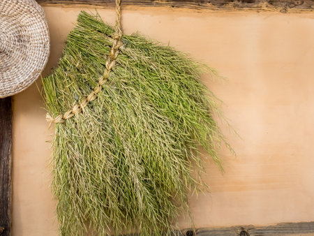 Dried herbs and spices hanging on the wooden background. Organic natural spice.の写真素材