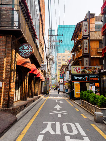 Seoul, South Korea - June 16, 2017: People walking down the small street in Seoul downtownのeditorial素材