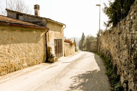 Narrow stone street in small town Fiesole, Italyのeditorial素材
