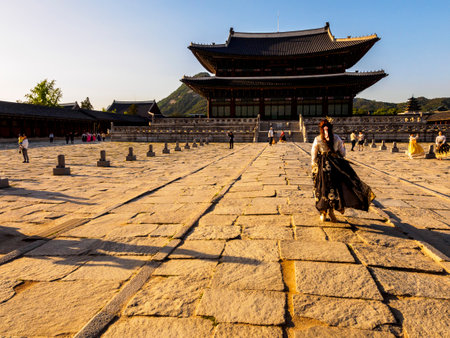 Seoul, South Korea - June 3, 2017: Young women in colorful traditional wear - hanbok visiting the Gyeongbokgung Palace.のeditorial素材