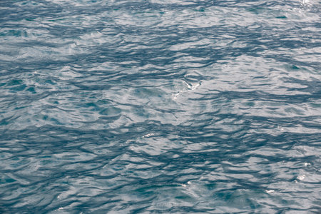 Aqua sea water surface. Nature background of blue ocean