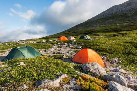 Tourist tents in the mountains. Kamchatka Peninsula, Russiaの写真素材