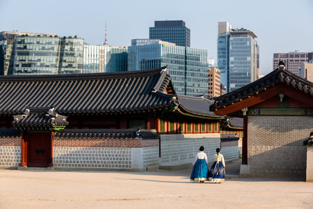 Seoul, South Korea - June 18, 2017: Young women in colorful traditional wear - hanbok visiting the Gyeongbokgung Palace.のeditorial素材