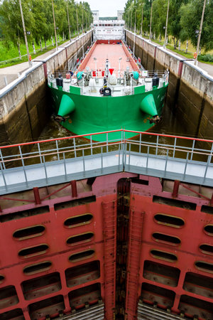 Vytegra, Russia - August 16, 2015: Cargo ship entered the White Sea-Baltic Canal Gateway. It...
