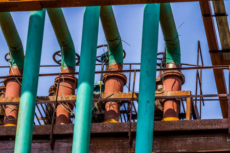 Close up image of rusty and green steel pipes in the plant. Industrial concept.の写真素材